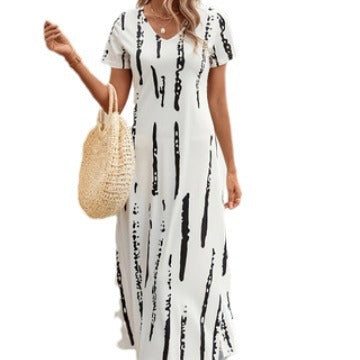 Women’s maxi dress with modern graphic design and practical side slits Ivyshape