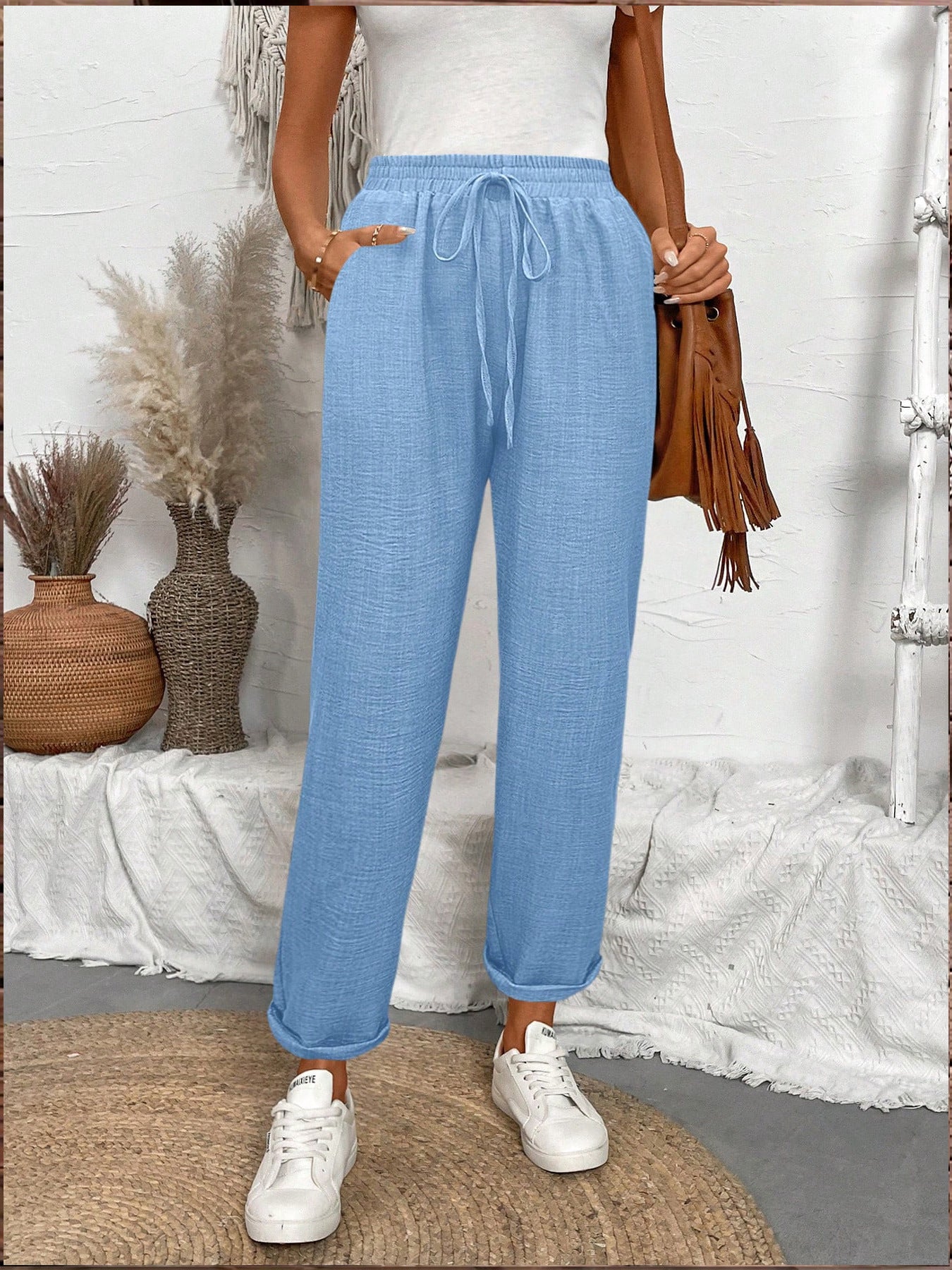 Women's lounge pants with elastic waistband and fashionable details Ivyshape