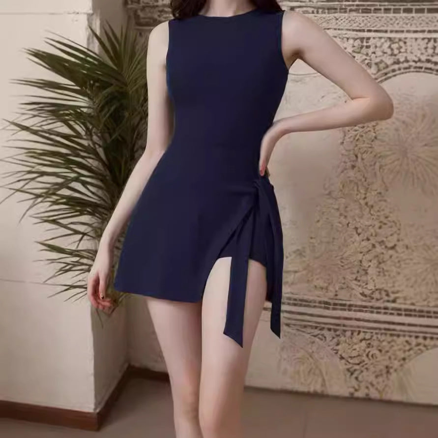 Women's swimwear with asymmetric draping and side tie belt Ivyshape