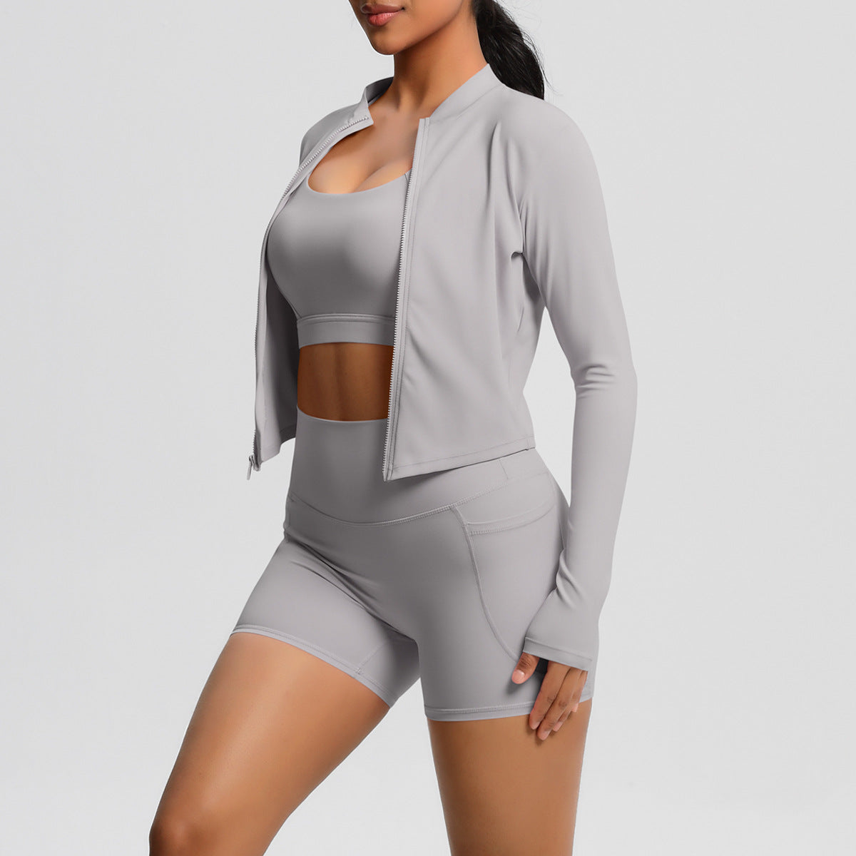 Women's sporty training set with fitted top and high-waisted shorts Ivyshape