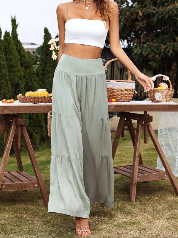 Women's wide-cut summer palazzo pants with high waist and pleated details Ivyshape