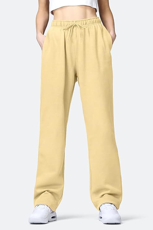 Women's comfortable sports pants with elastic waistband and practical pockets Ivyshape