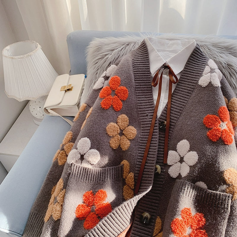 Knitted Cardigan With Flower Pattern And Pockets